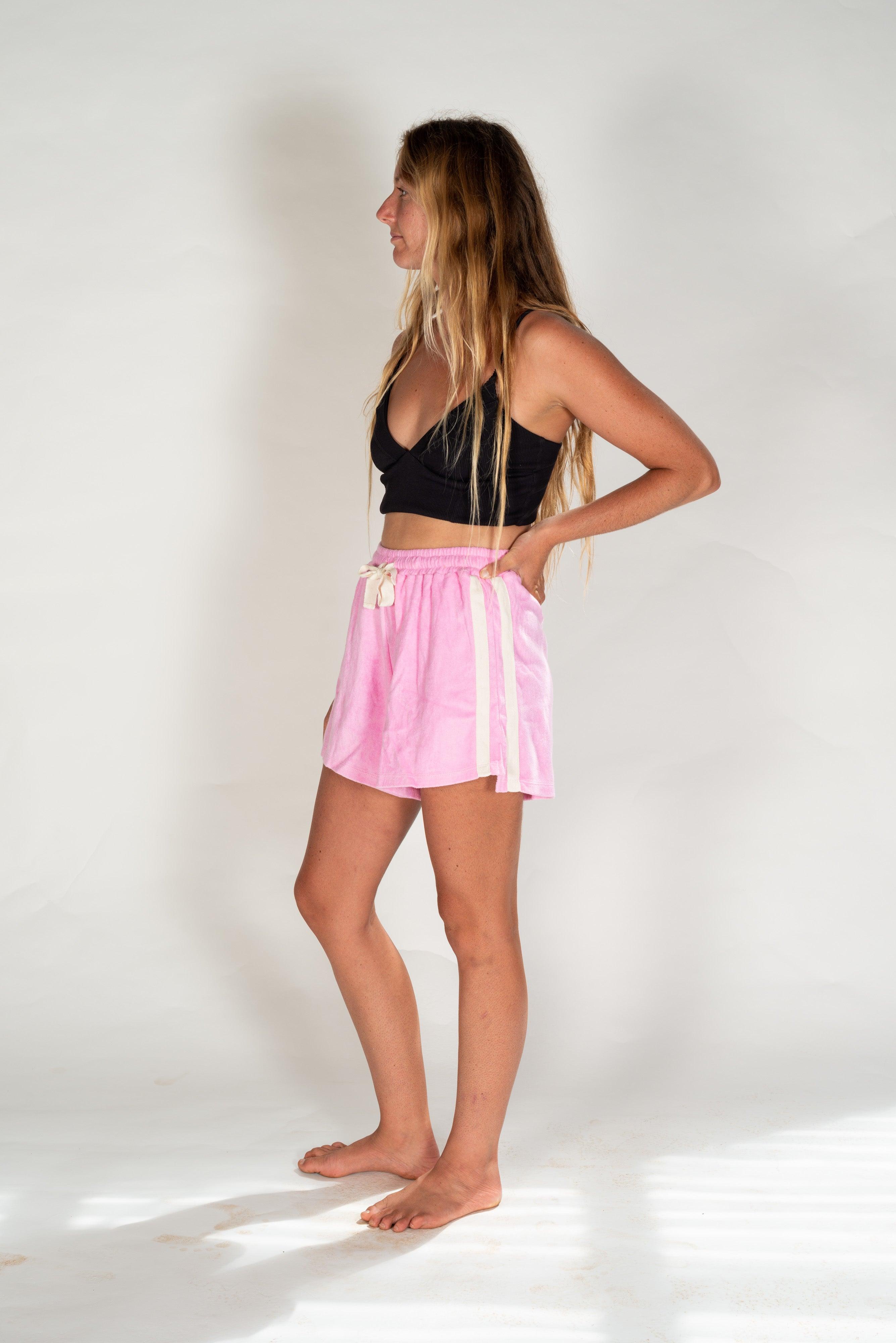Side view of pink terry shorts