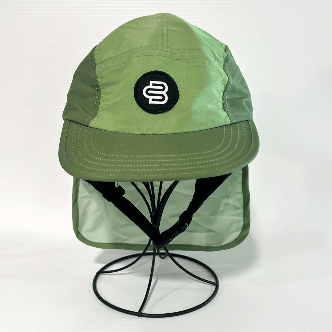 Front view of green surf cap