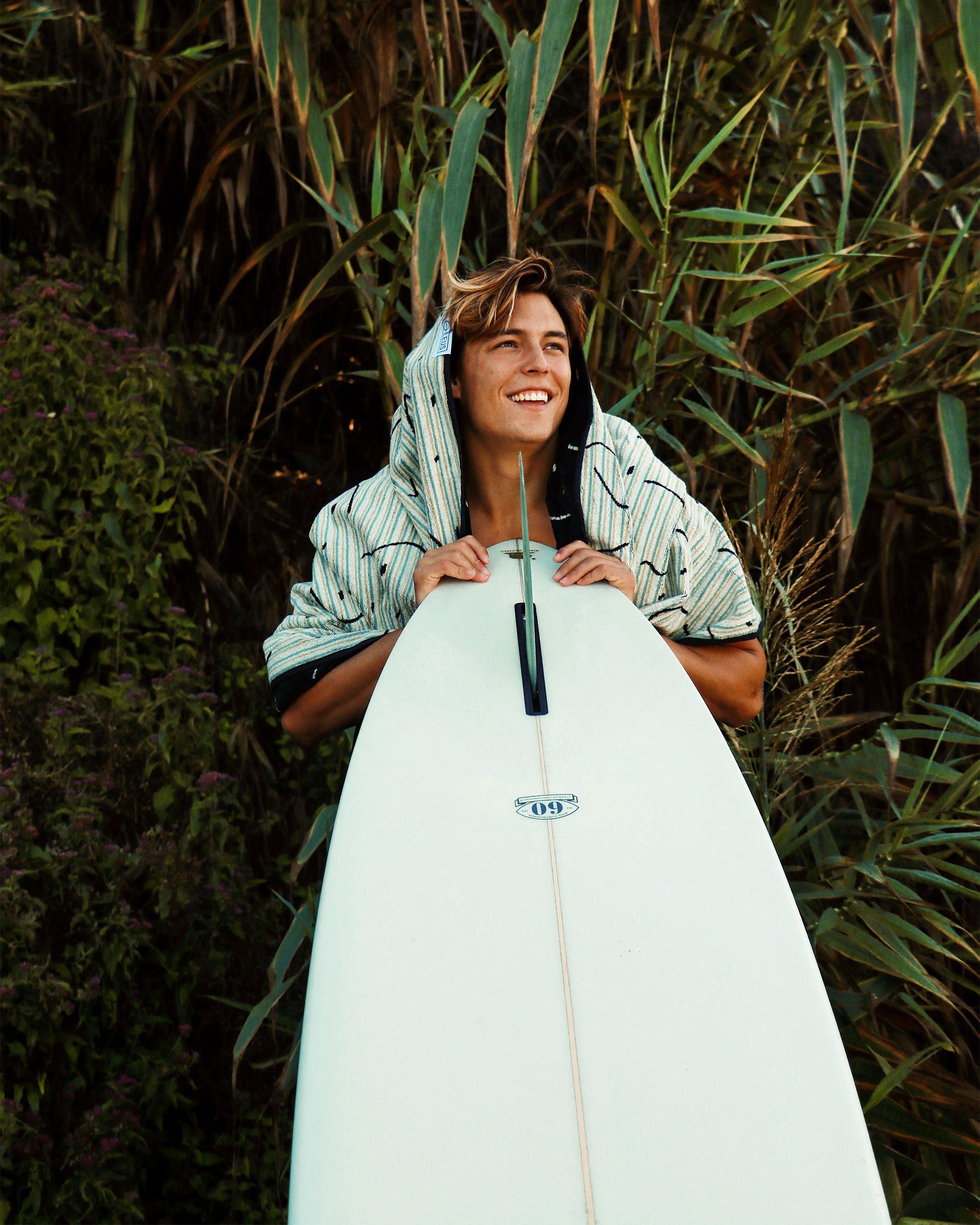 LEUS Midnight XL Beach Towel on surfer