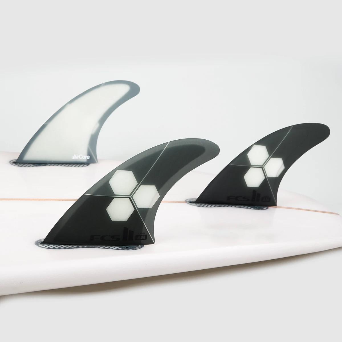 FCS II Al Merrick AIR CORE Tri Fins on a surfboard