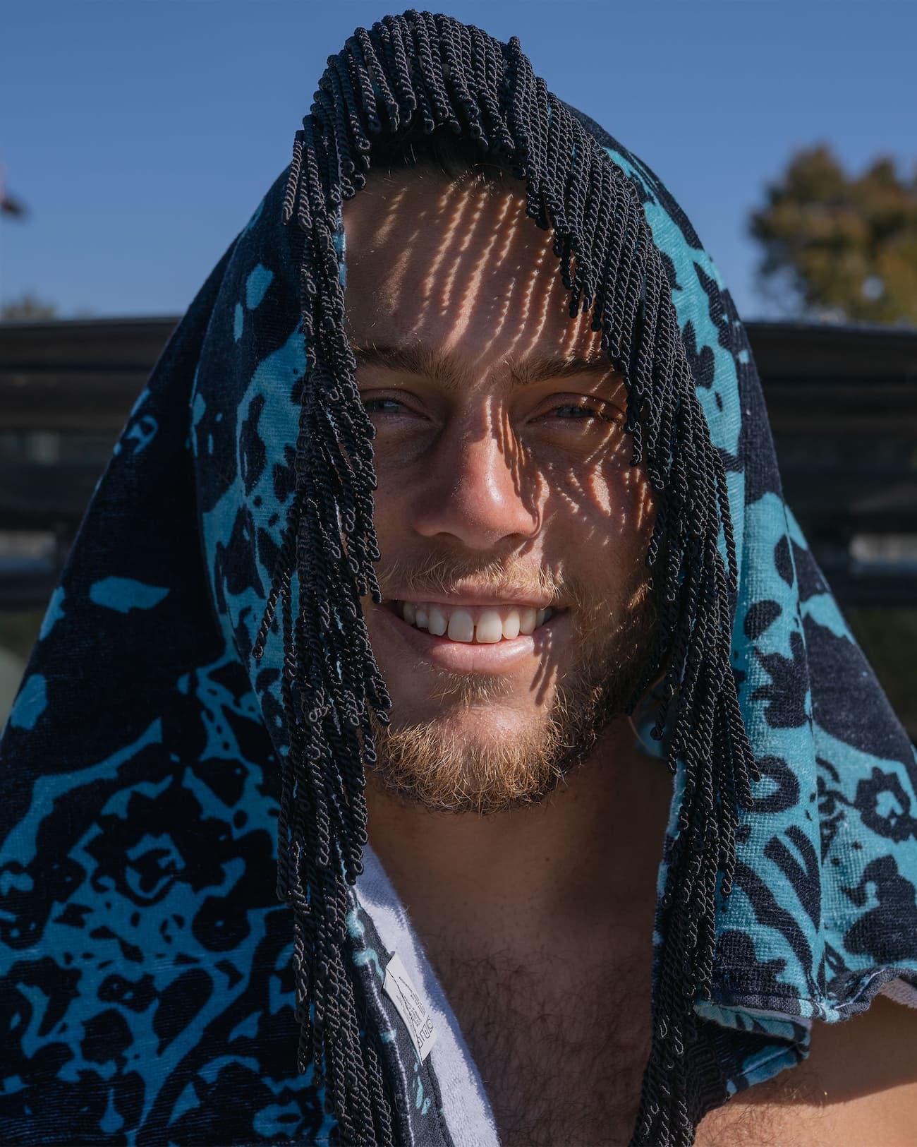 Conner Coffin Beach Towel on Conner's head