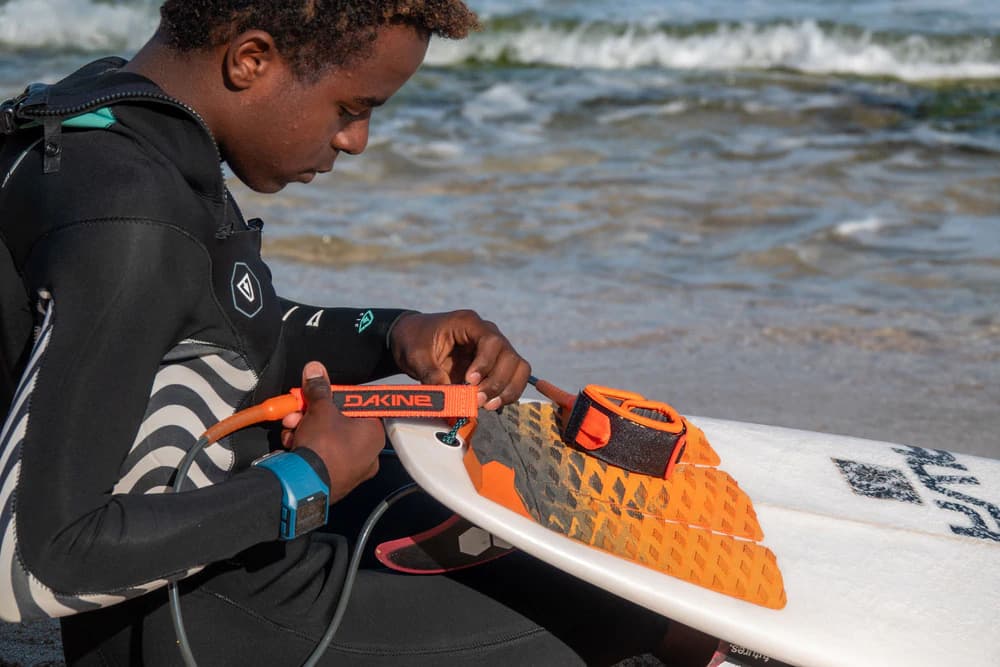 Dakine 7ft Kainui Team Leash - Shadow model at beach