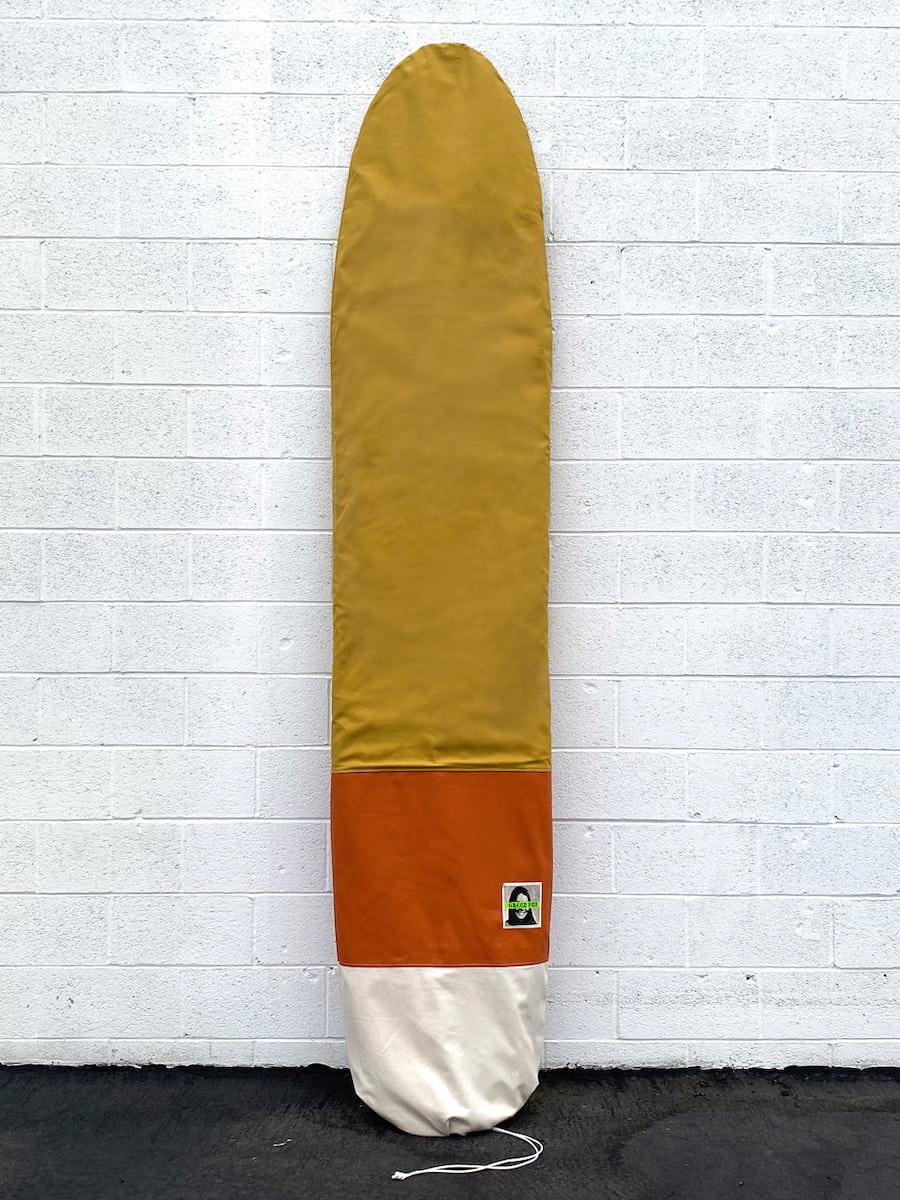 Green Fuz Gold Soundz Log Board Bag front