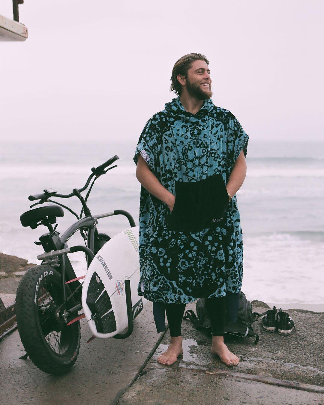 Conner Coffin wearing LEUS Changing Poncho Towel