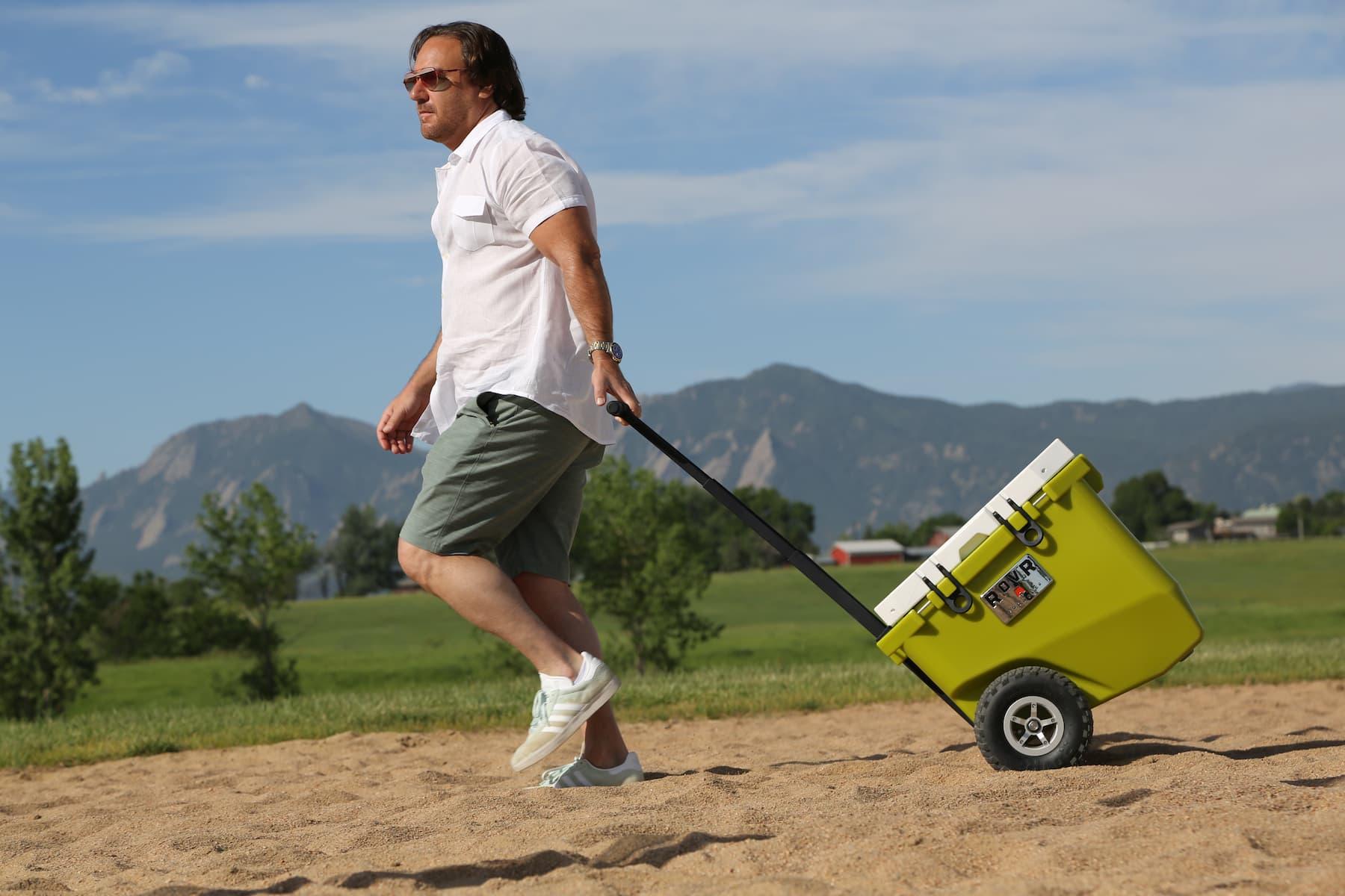 ROVR RollR 45 Cooler - Moss pulled by male