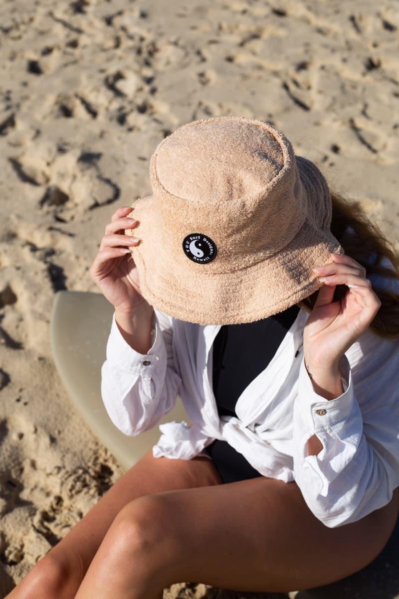 Town & Country Terry Beach Hat - Sand woman wearing on beach