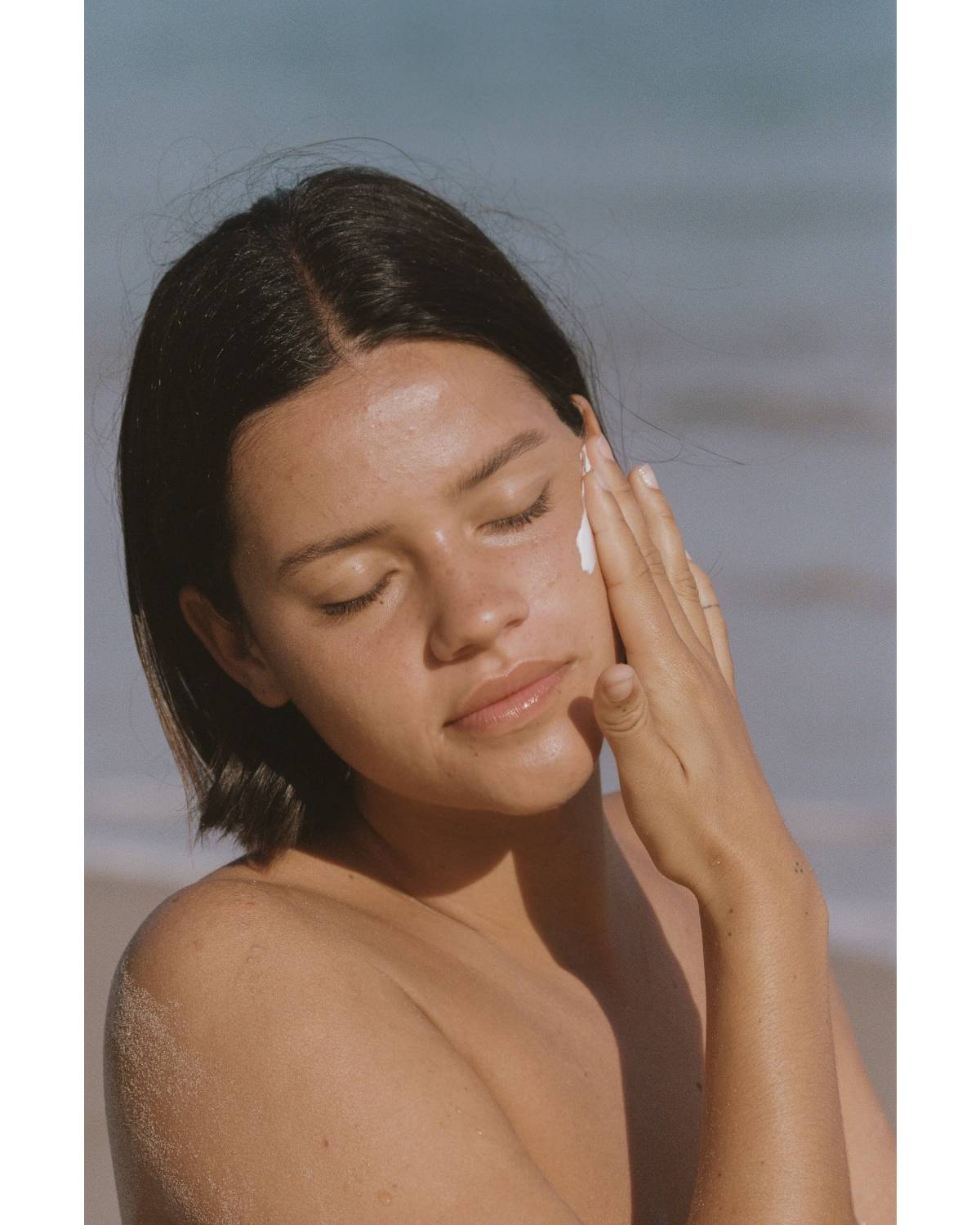 Sun Juju Mineral Based SPF50 Sunscreen Cream applied to face