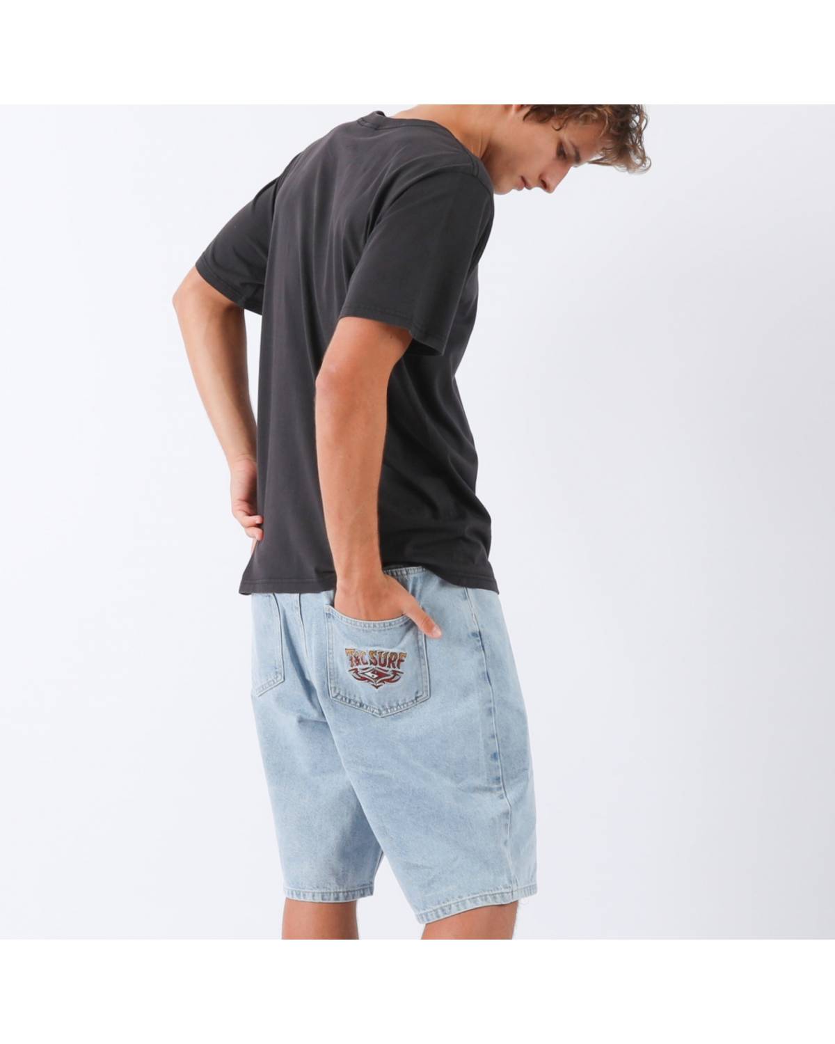 Model wearing denim shorts