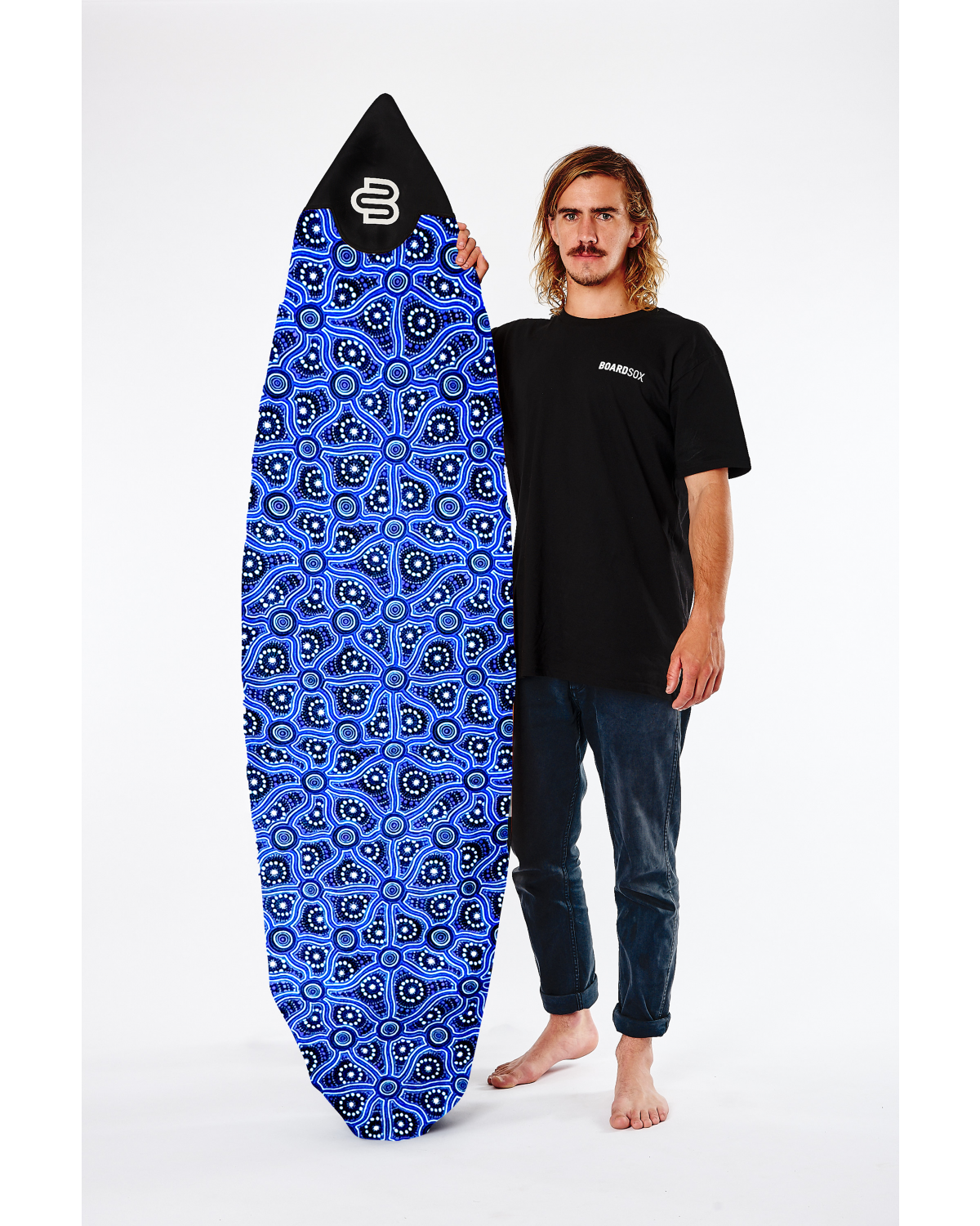 Model holding surfboard