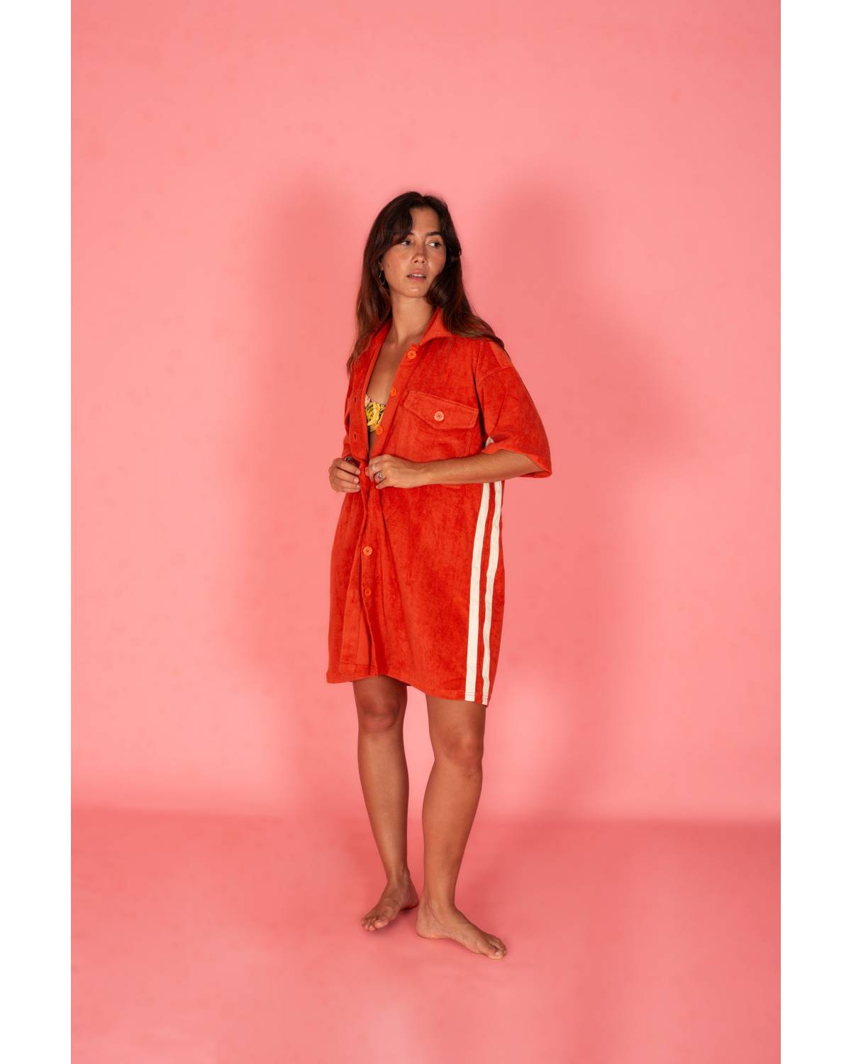 Model adjusting Après Surf Dress