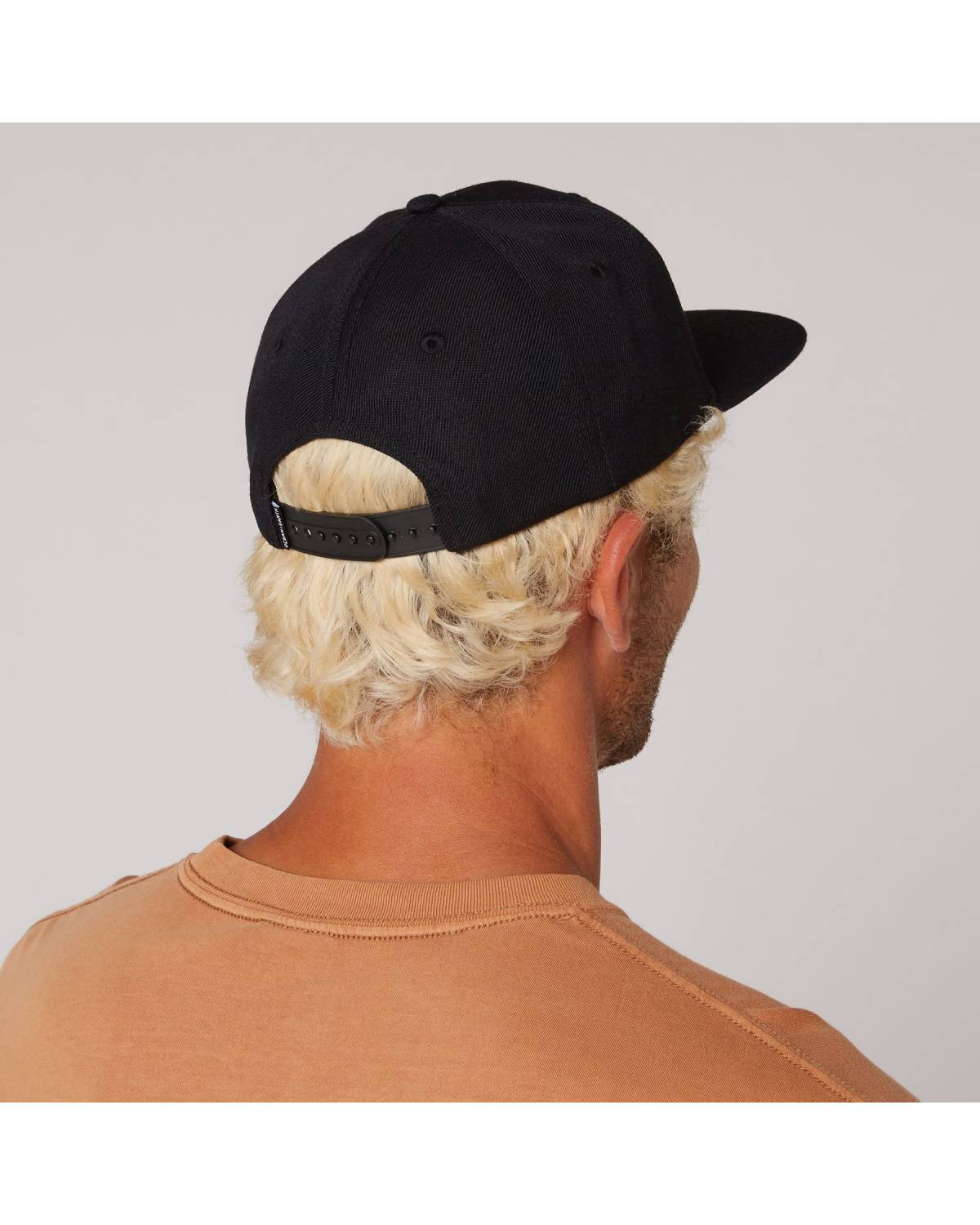 Back view of Priority Cap on model