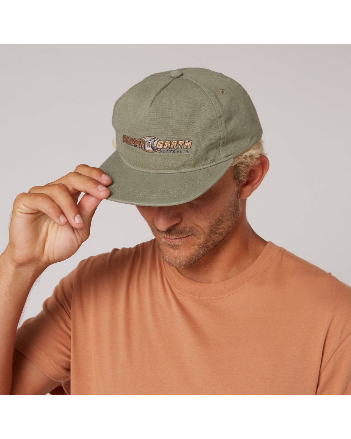 Person wearing Olive Nineties Wave Cap