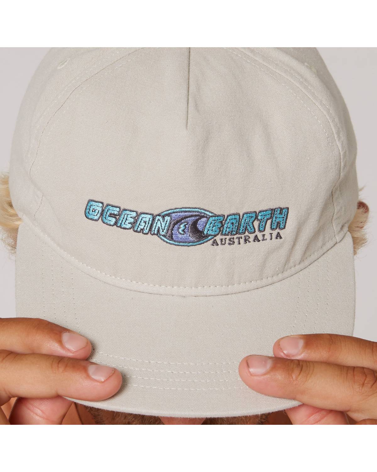 Close-up of Vintage White cap logo