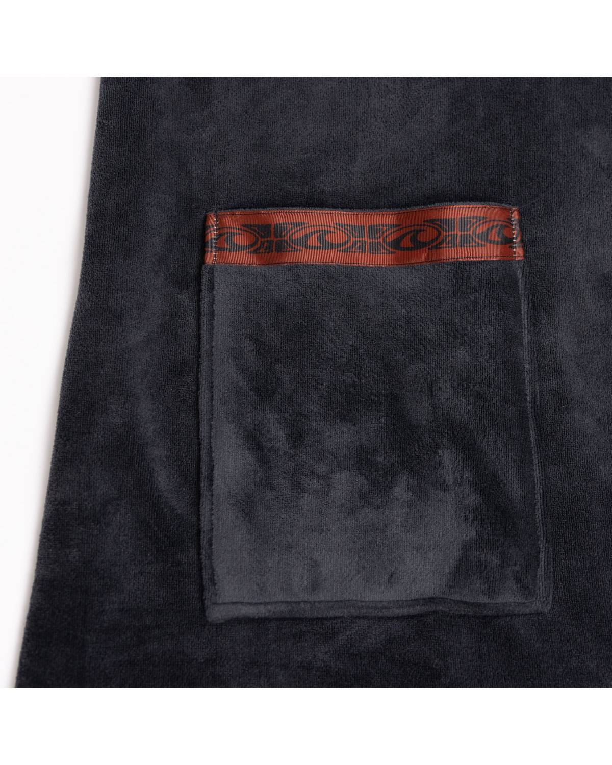 Back view of dull black poncho