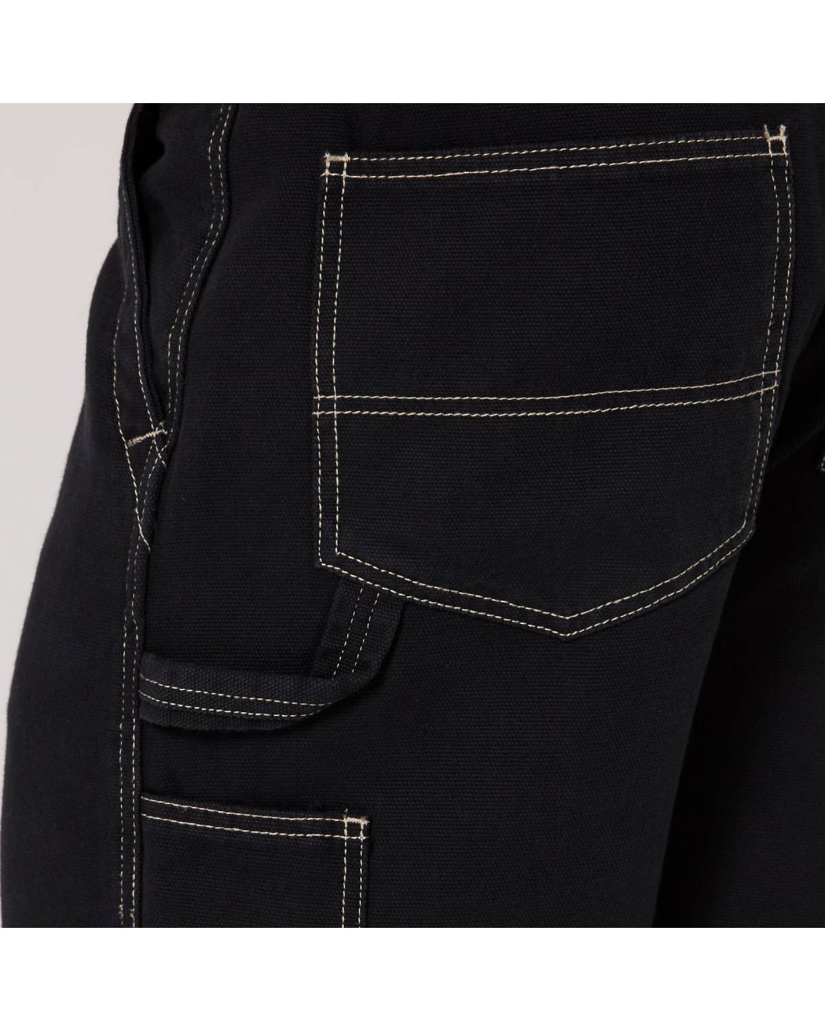 Close-up of black shorts stitching