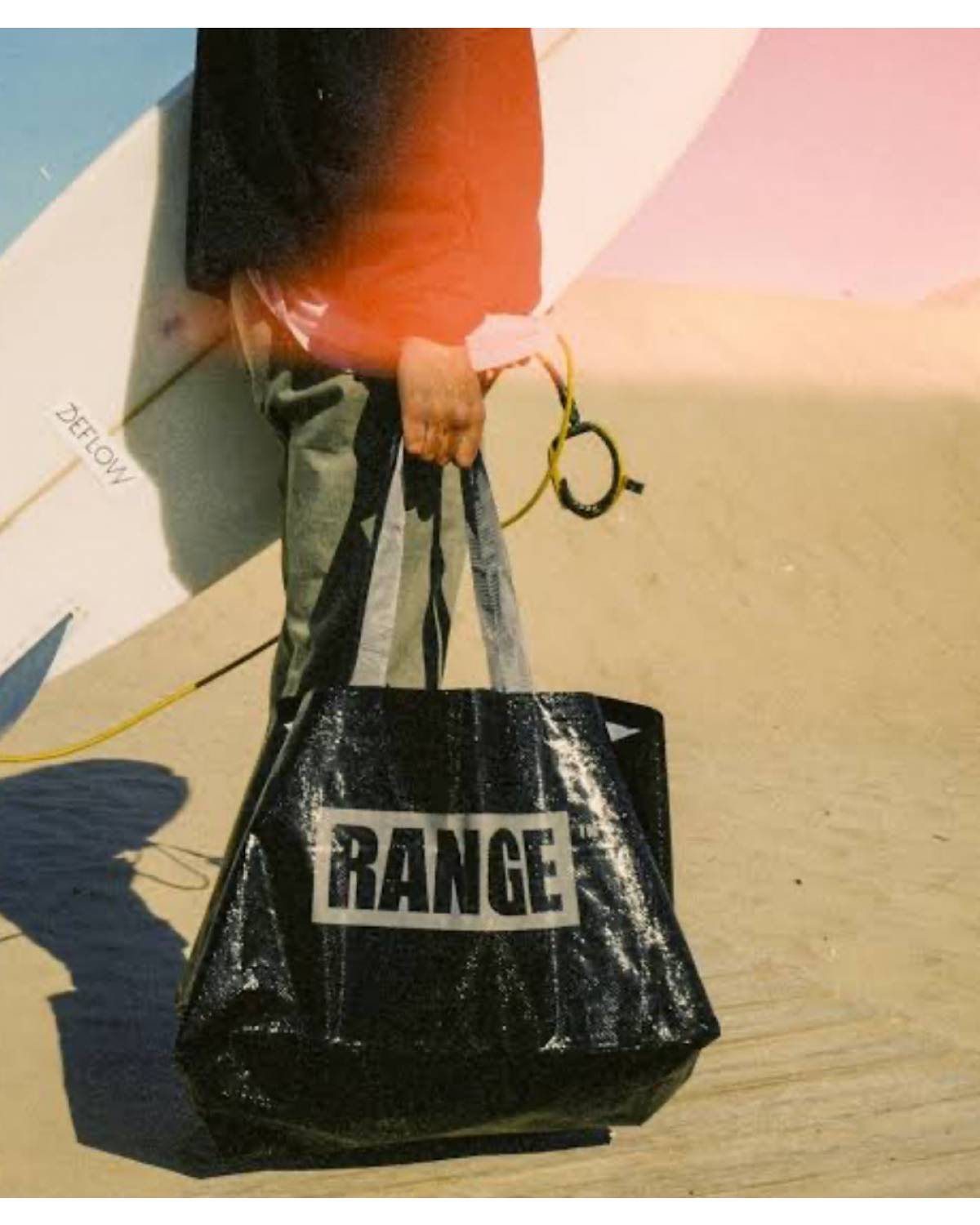 Beach bag with surfboard