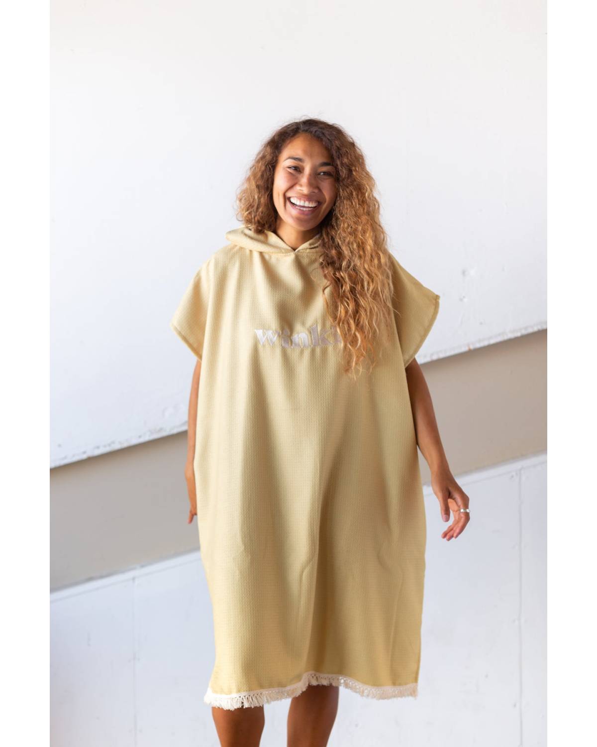 Close-up of mustard hooded towel