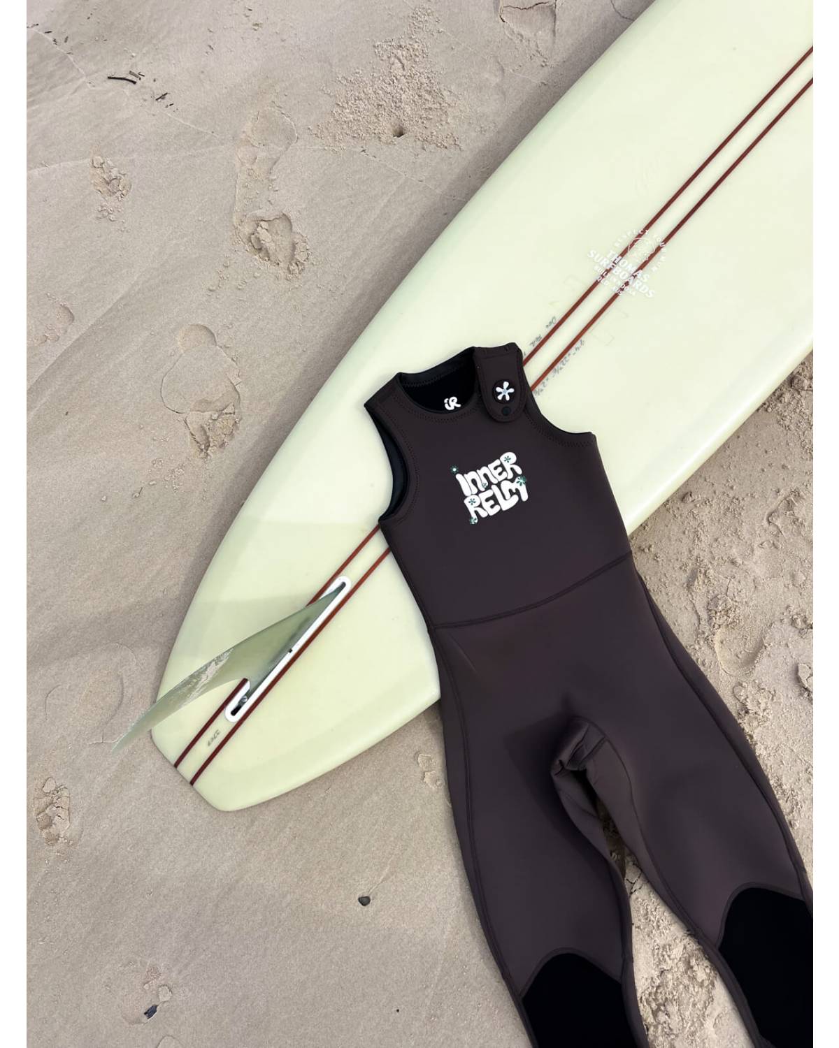 Wetsuit with surfboard