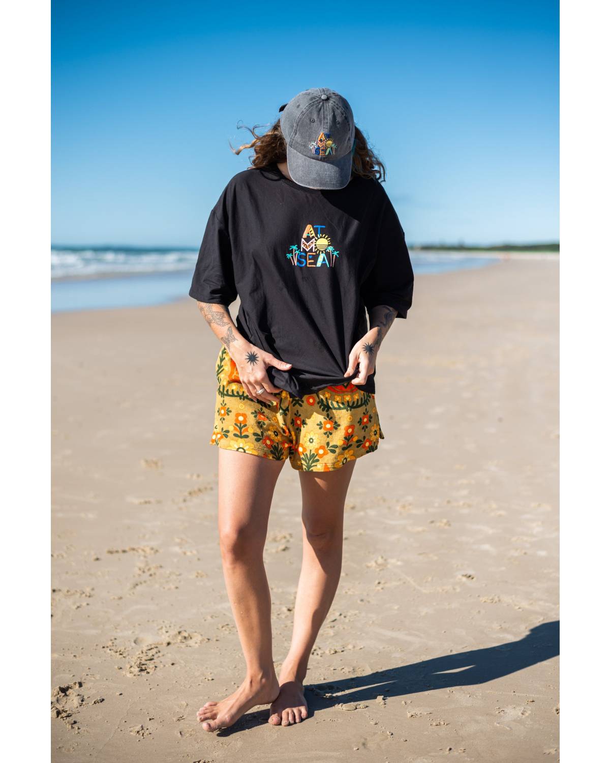Fun Tee on beach, looking down