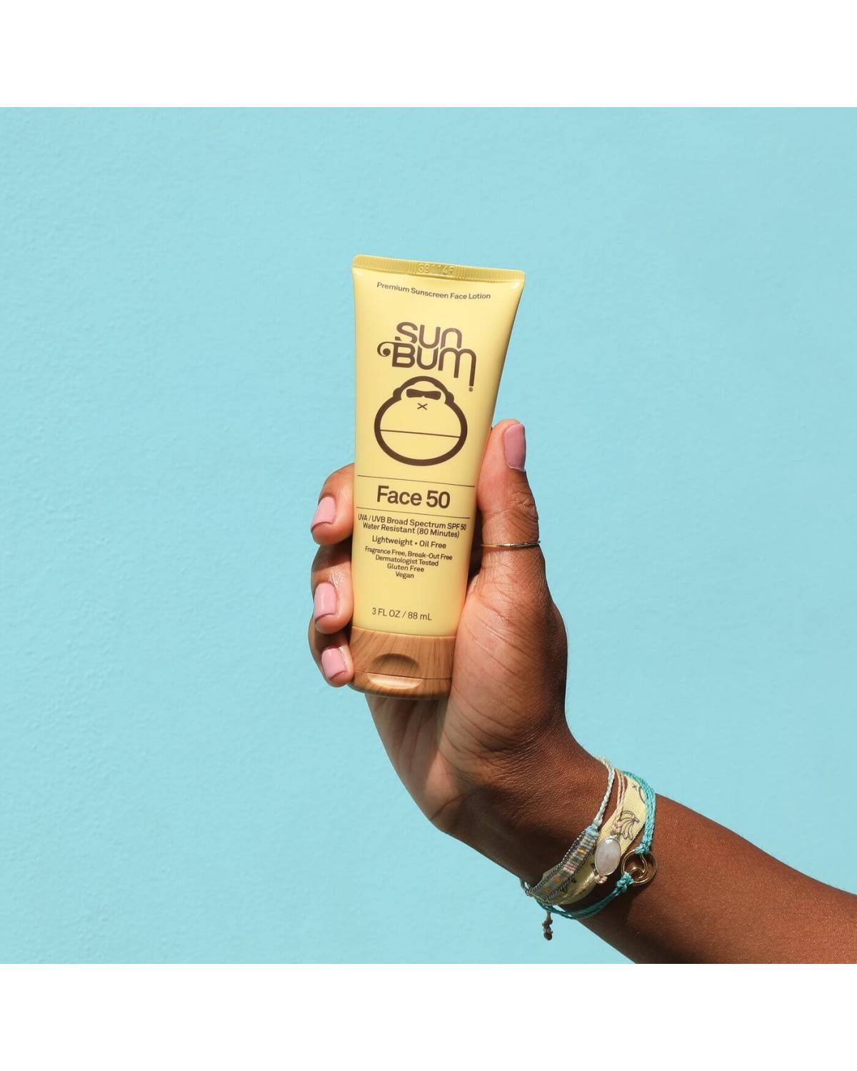 Sun Bum Face Lotion SPF 50+ sunscreen in a hand