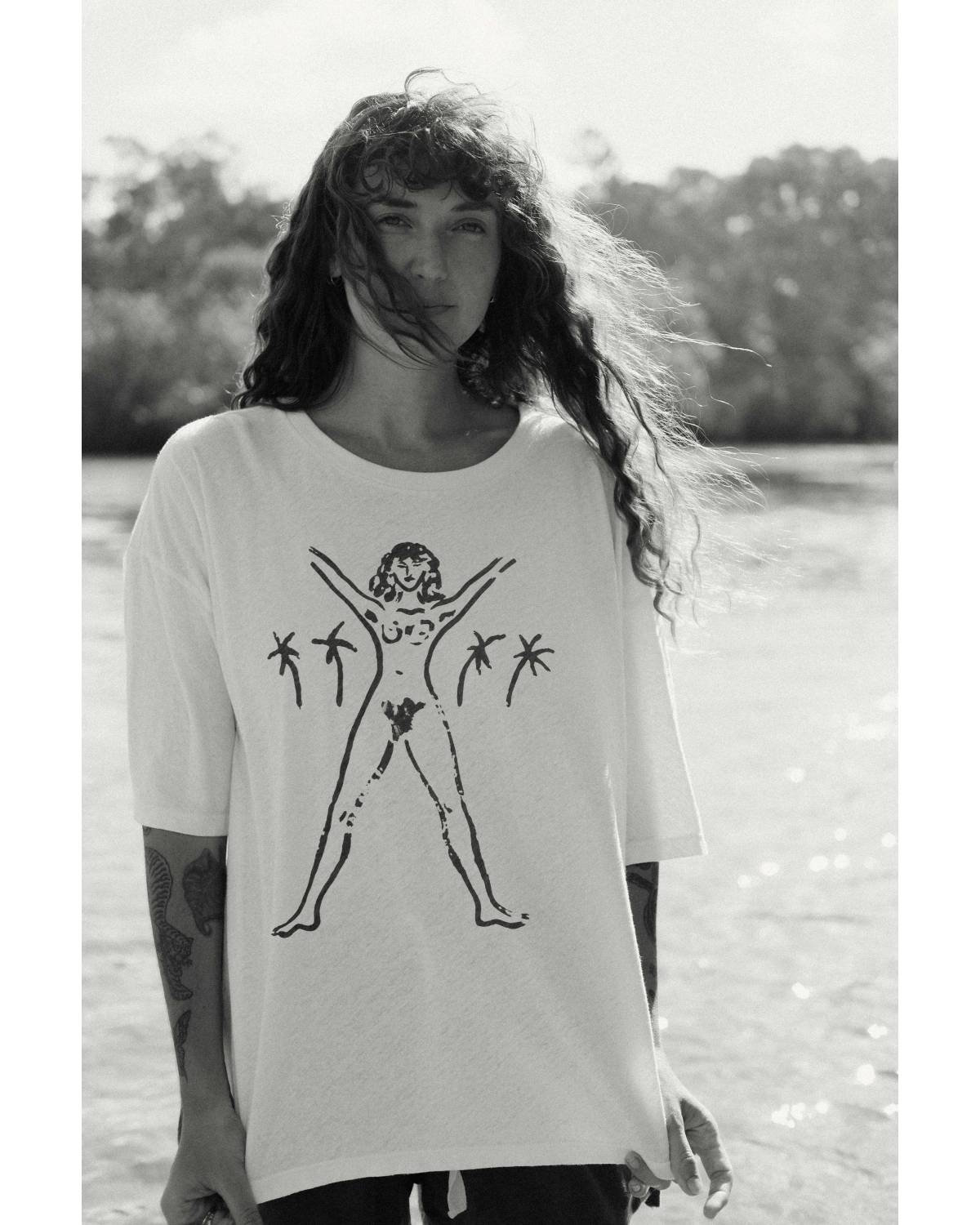 Model in Bush Woman Tee outdoors
