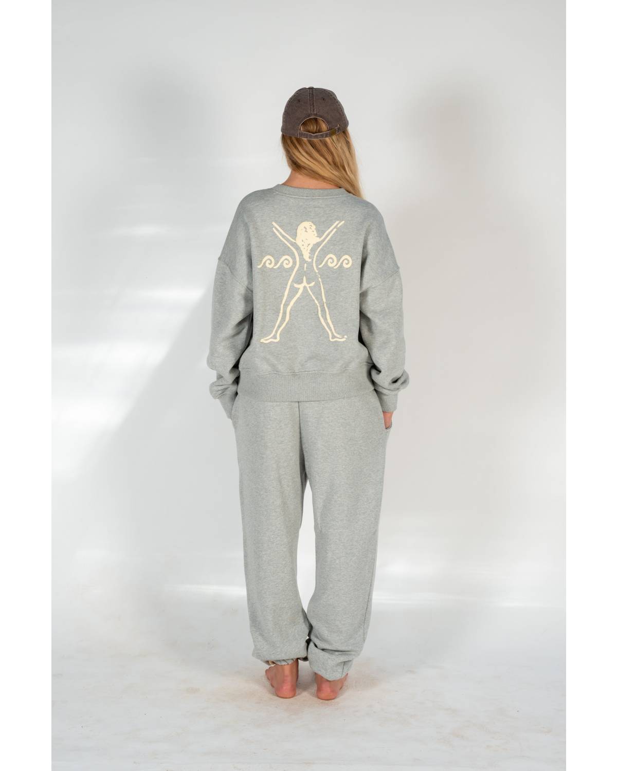 Model leaning in Bush Woman Track Pant