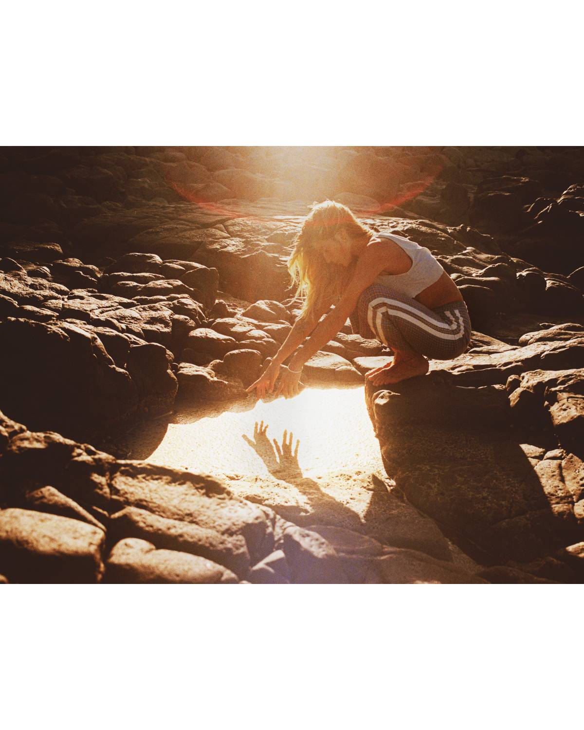 Flannel pants on rocks with sun