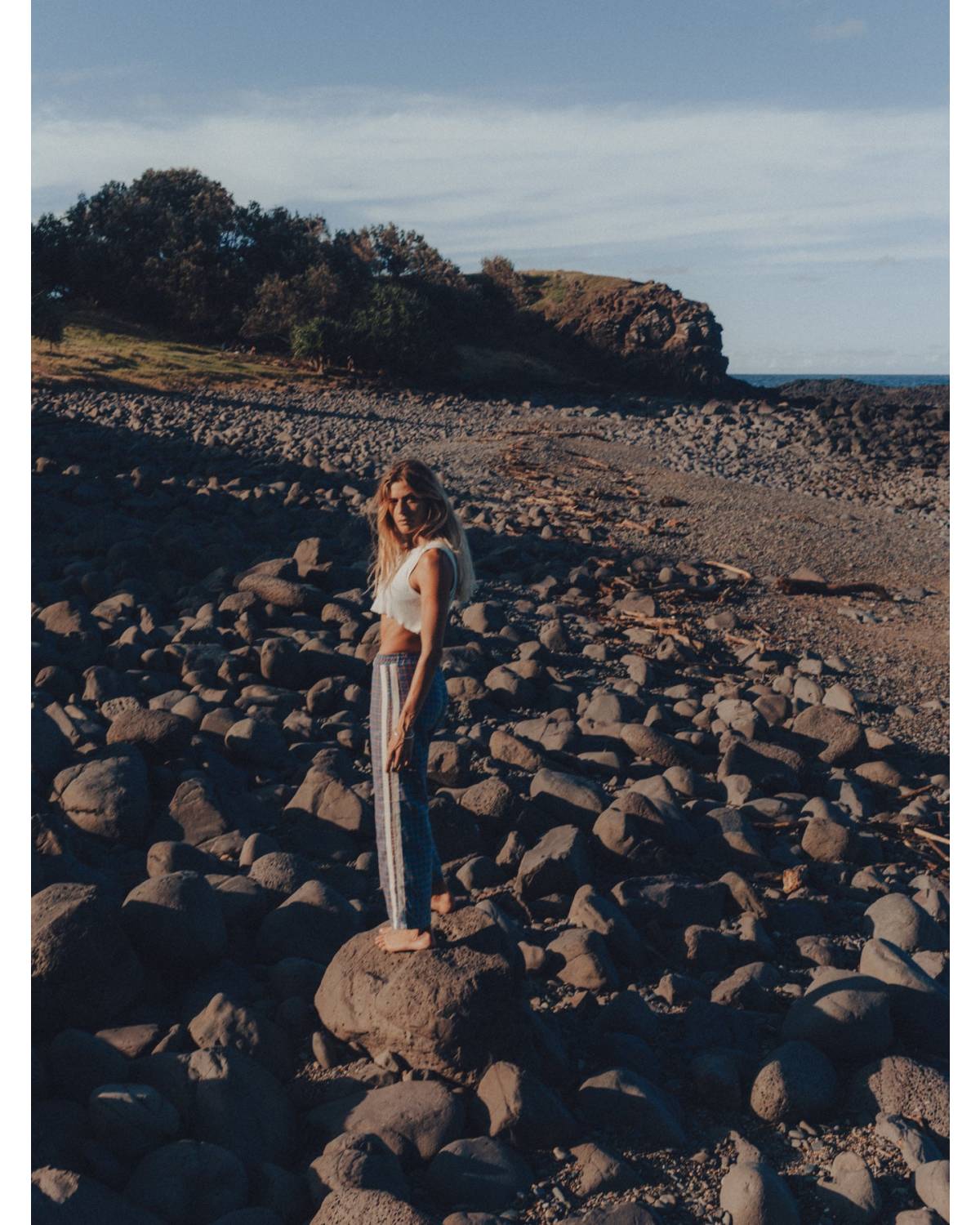 Flannel pants on rocks landscape