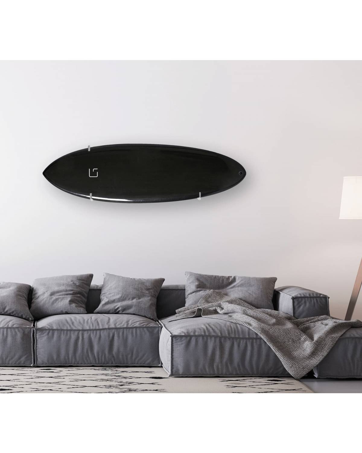 Ghost Racks Horizontal Surfboard Wall Display holding a black surfboard