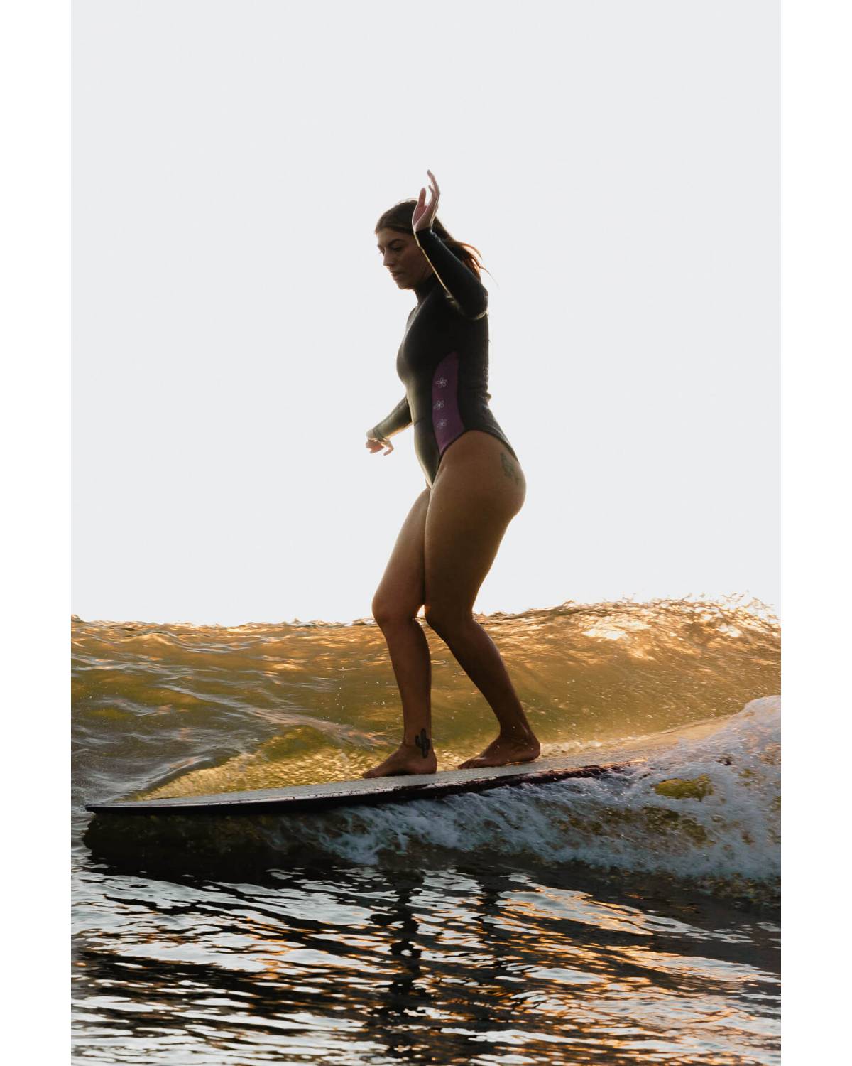 Inner Relm DiscoPop 2mm Springsuit on model at the beach