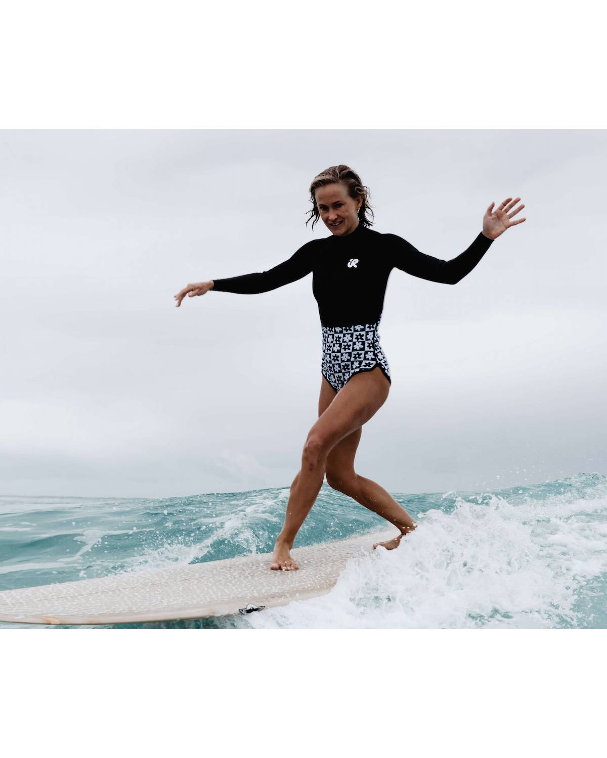 Inner Relm Daisy Venom 2mm Springsuit - Chequer model in action