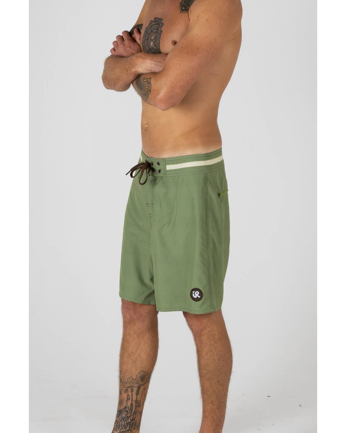 Side view of green trunks