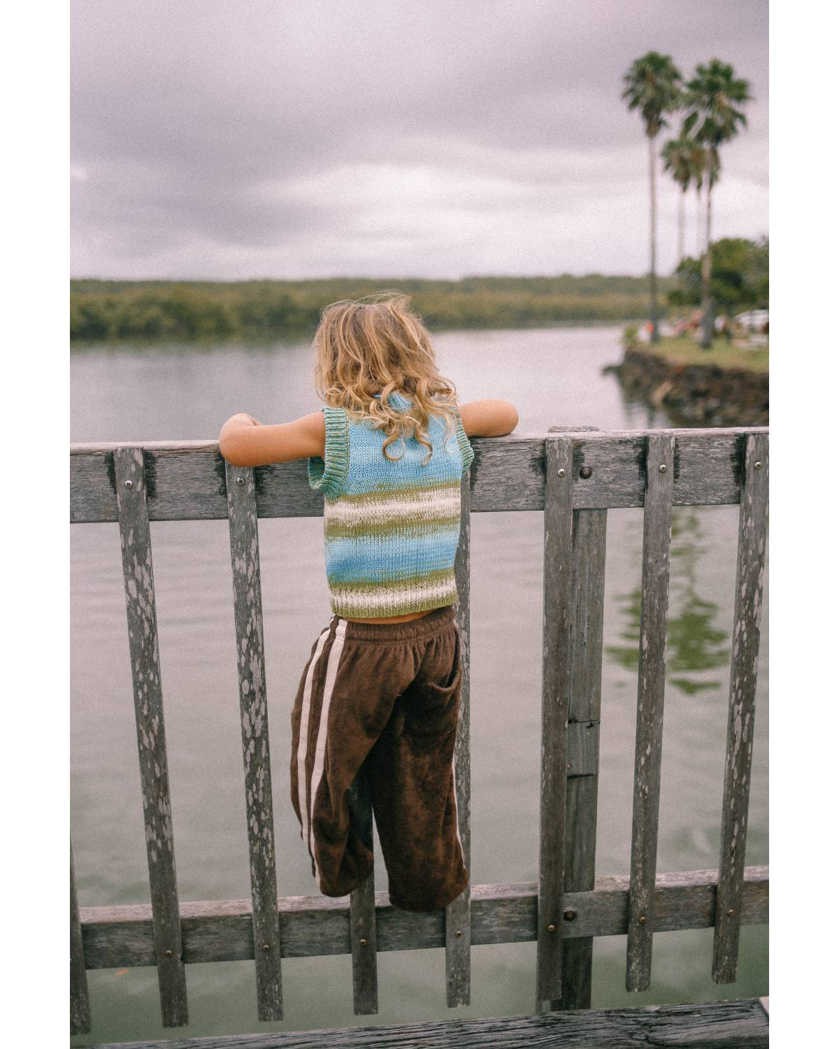Two children by water