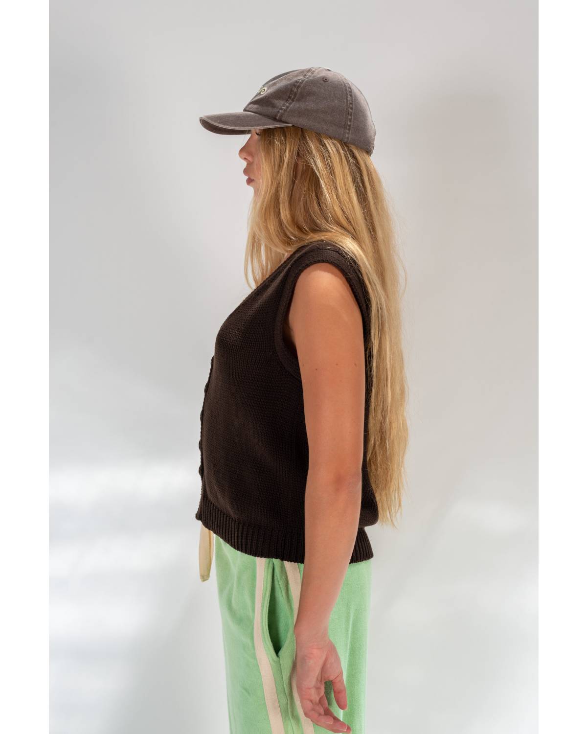 Model in Knit Vest, side view
