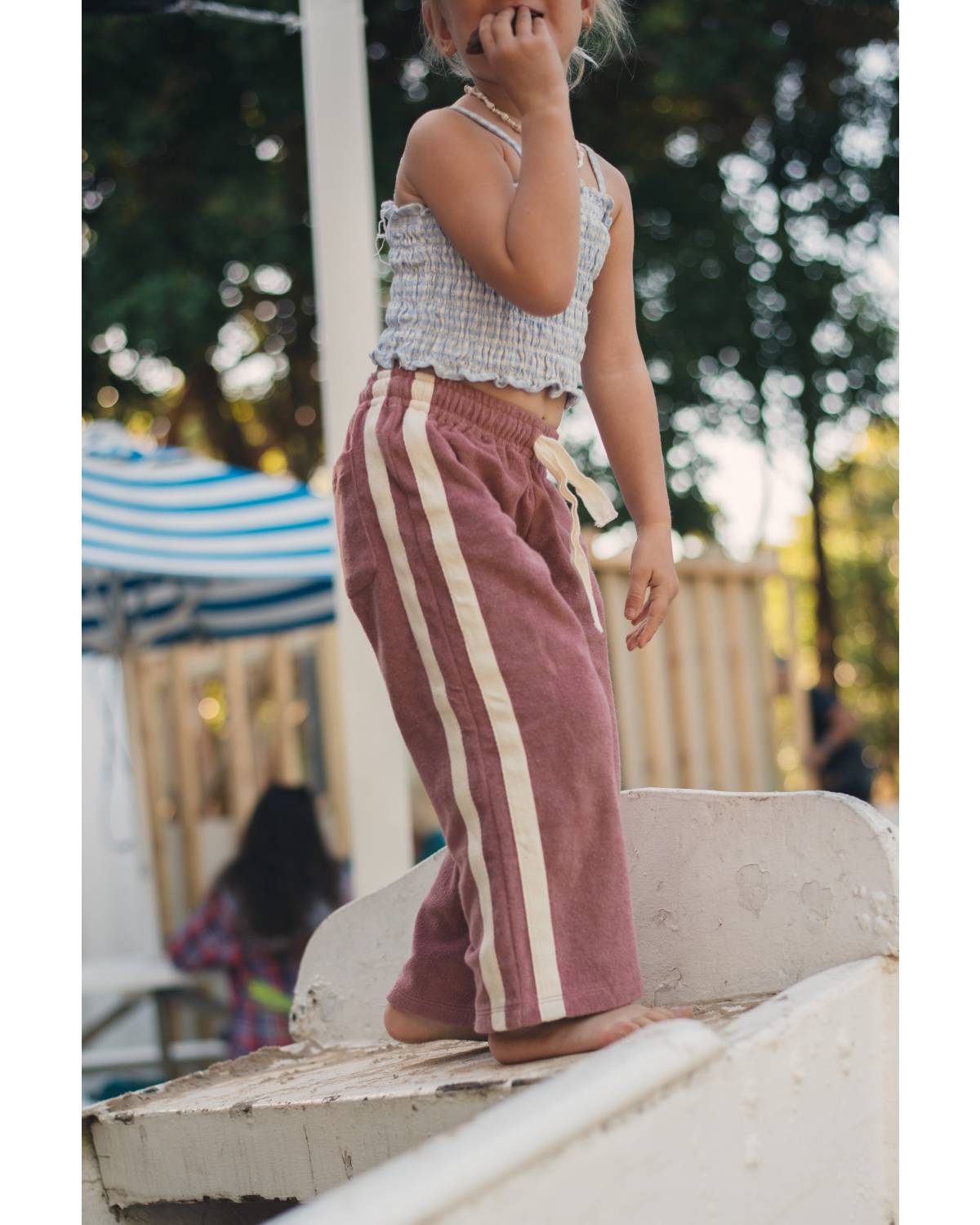 Lifestyle image with Mini Terry Pant