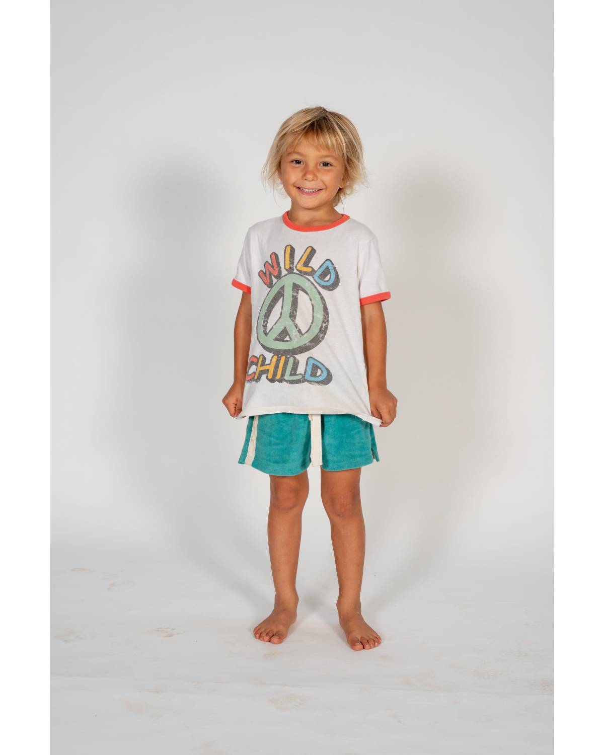 Child kicking in shorts