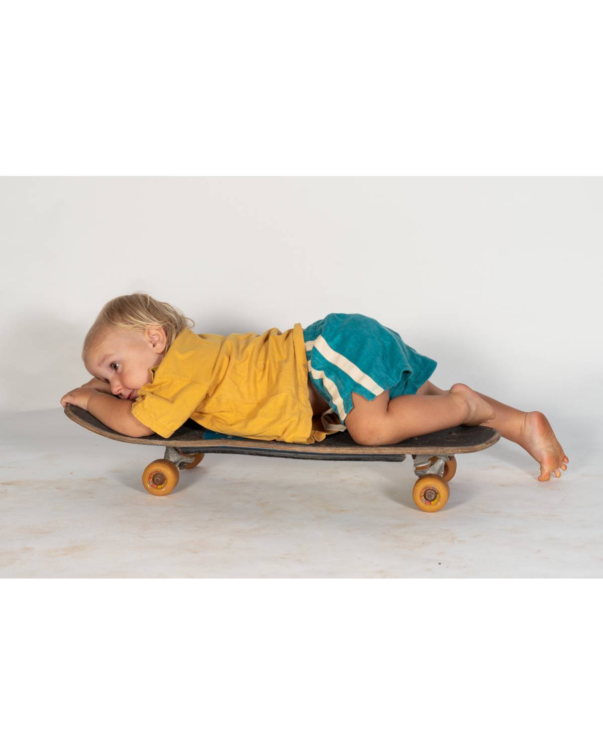 Child posing in shorts