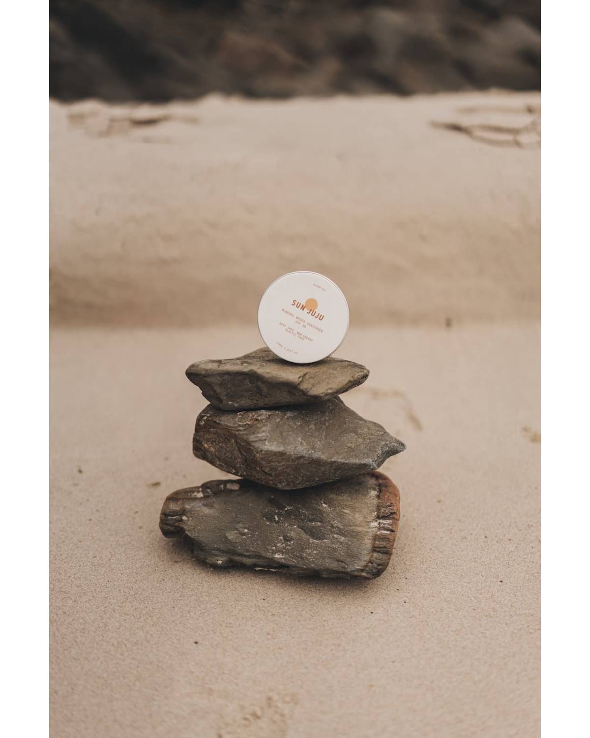 Sun Juju SPF50 Sunscreen on rocks