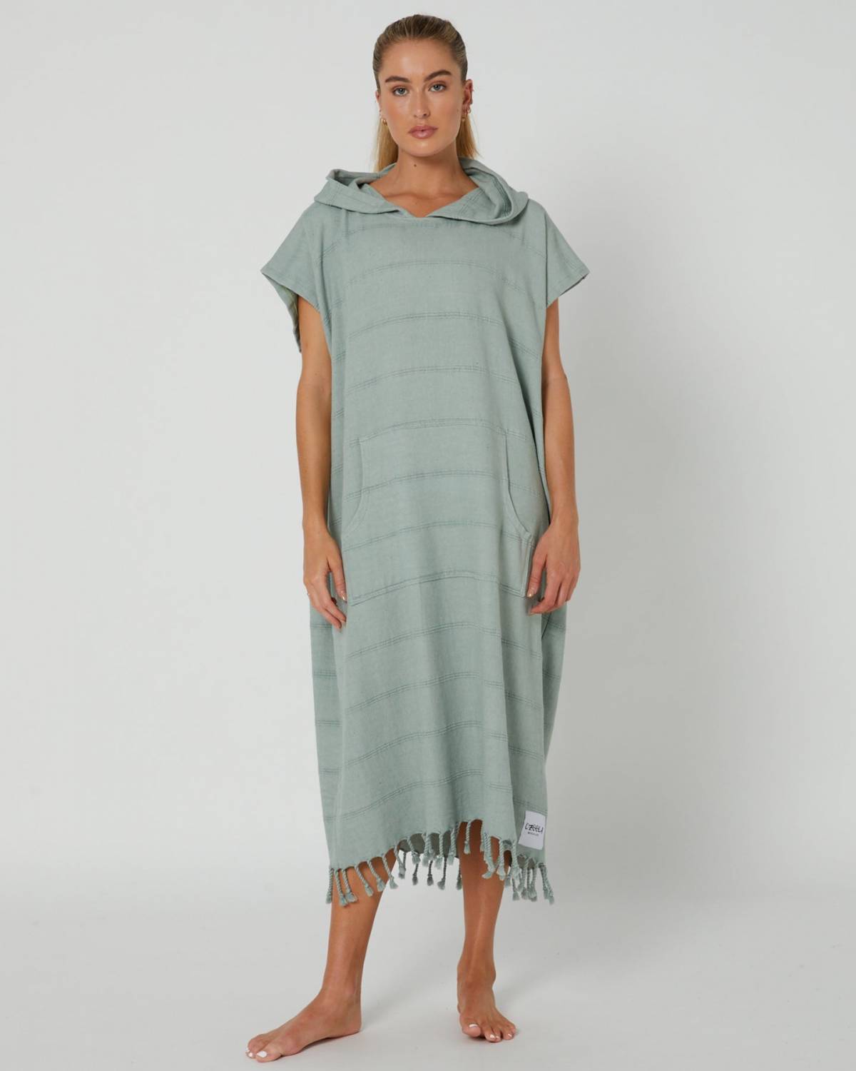 Model wearing poncho front