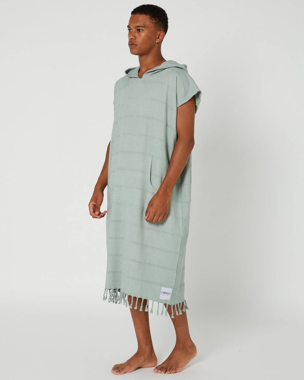 Model wearing poncho side