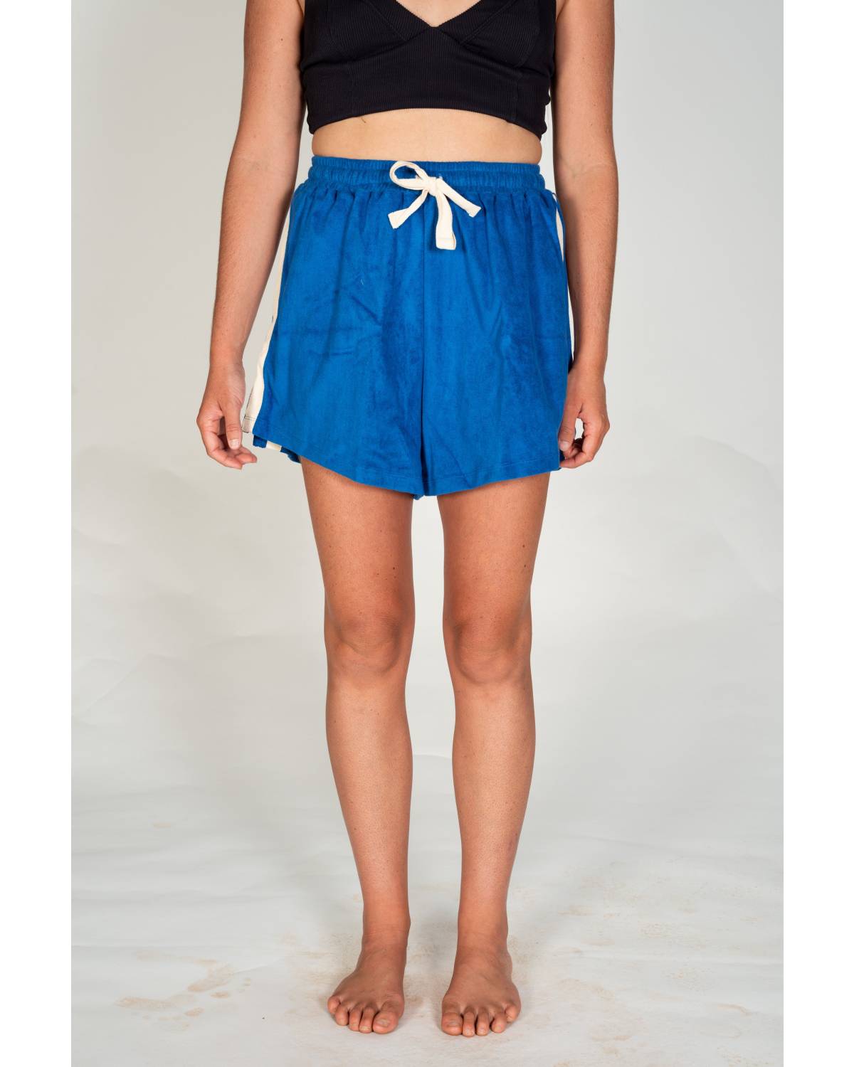 Model posing in Cobalt Terry Towelling Shorts