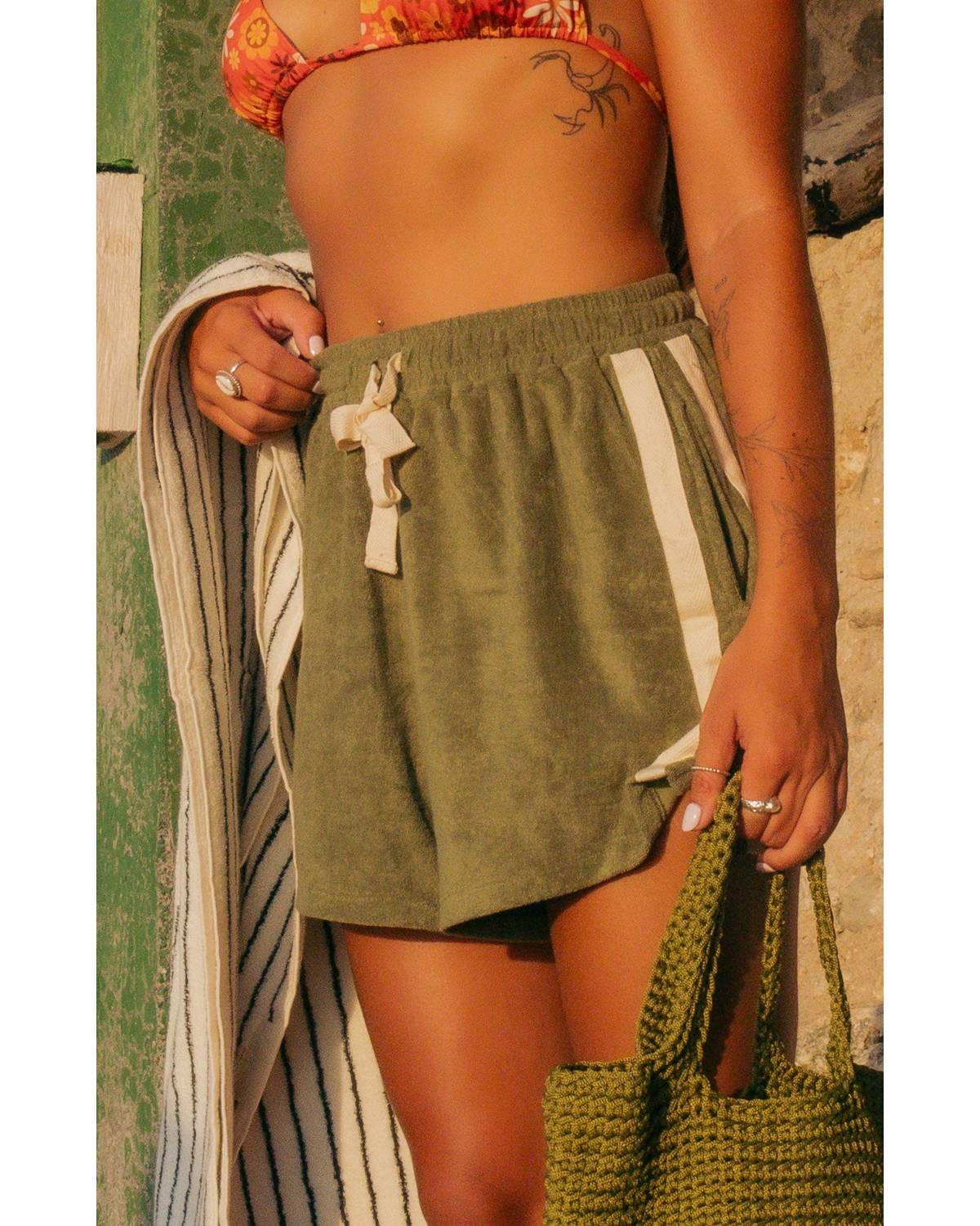 Close-up of shorts on model
