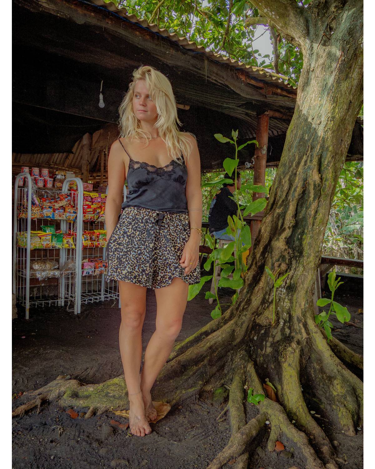 Model on scooter with shorts