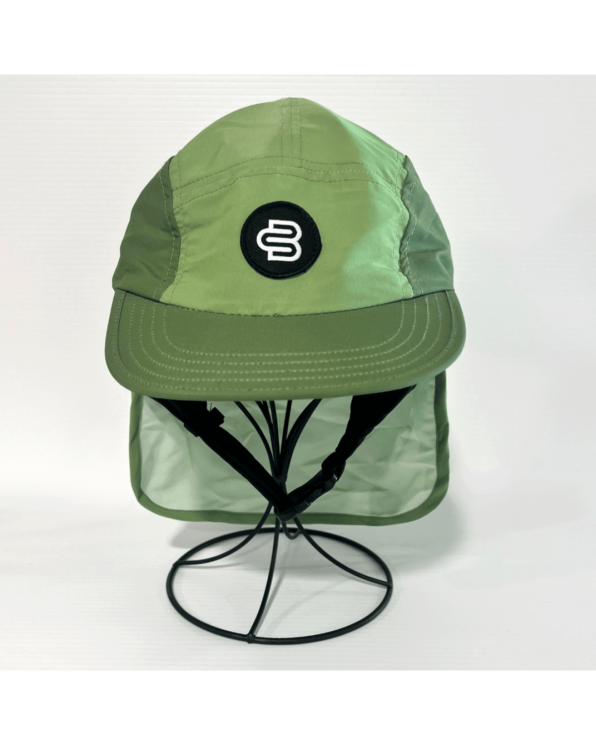 Front view of green surf cap