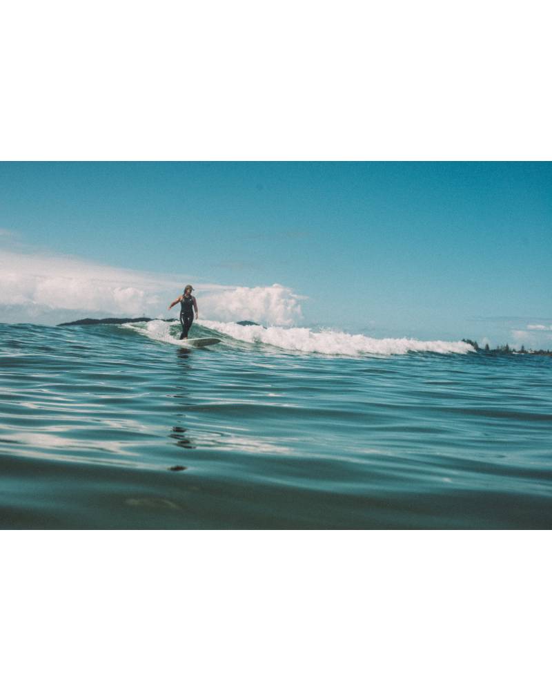 Atmosea Dad Cap - Vintage Khaki on surfer catching a wave