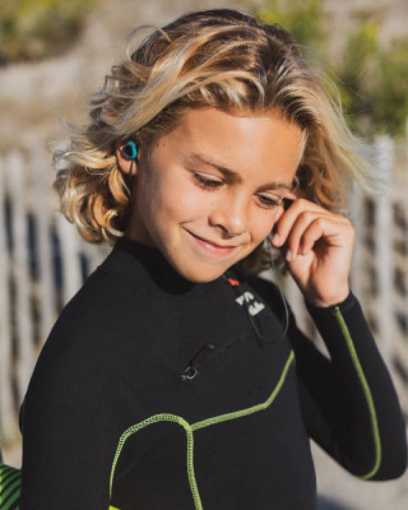 Surfears 2.0 worn by a kid grom surfer