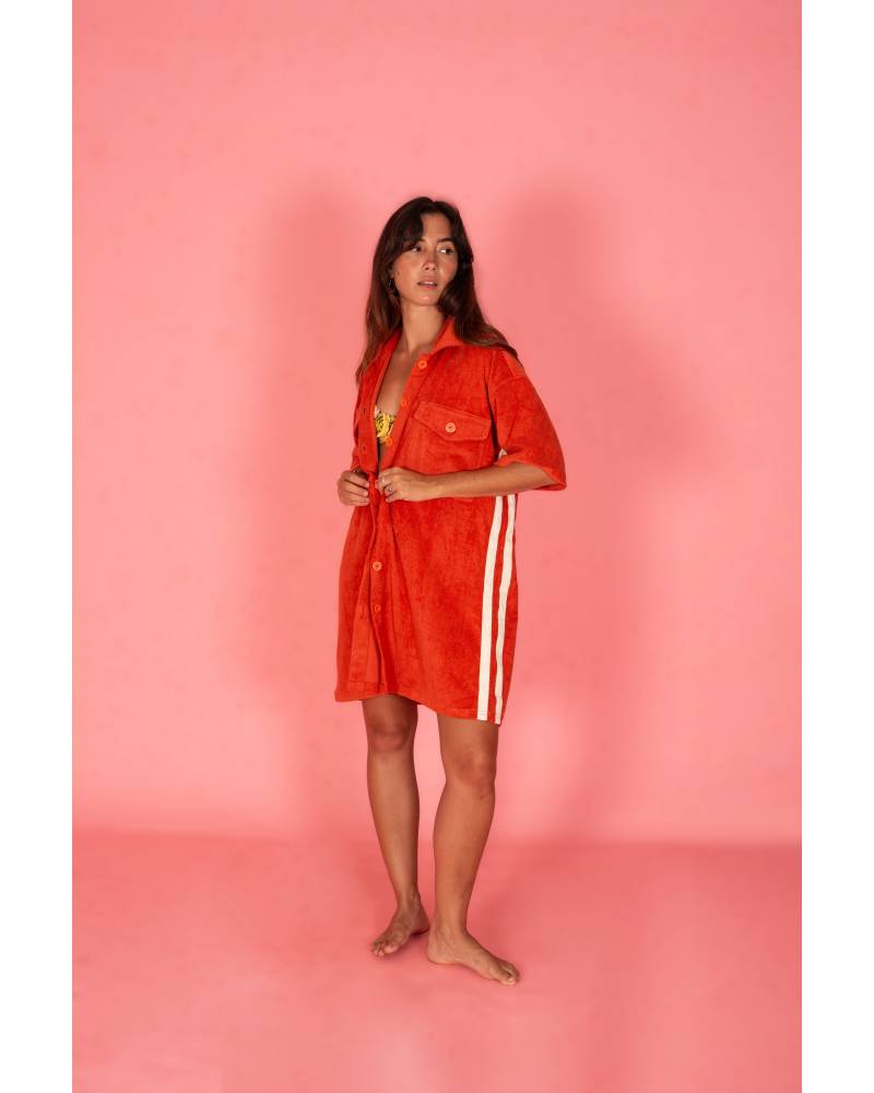 Model adjusting Après Surf Dress