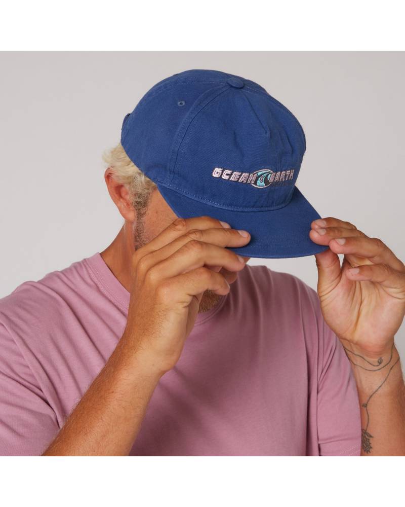 Person wearing Denim Blue cap