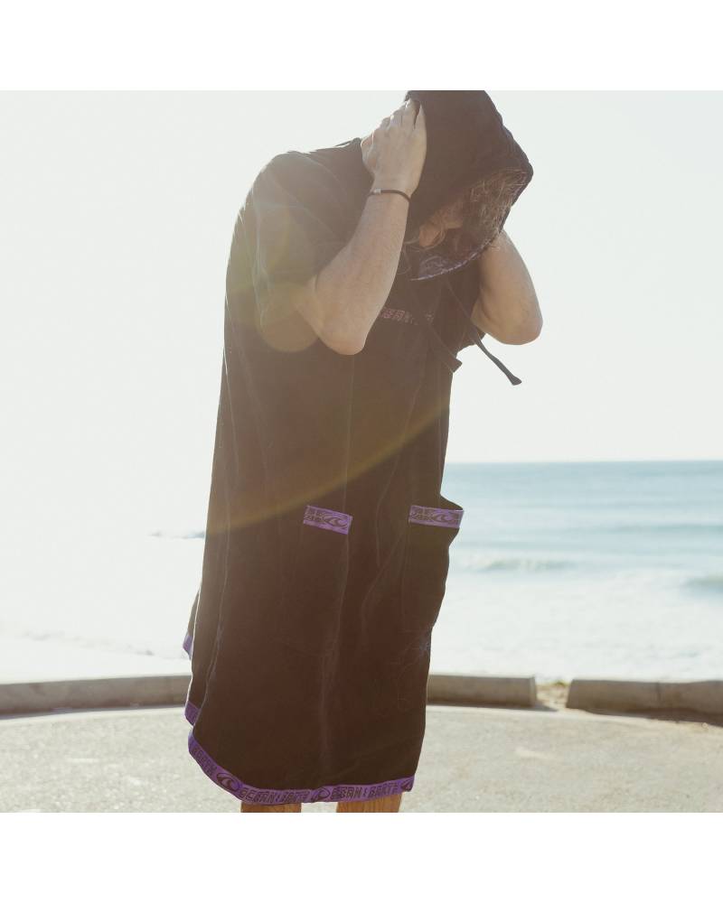 Lifestyle image of black poncho