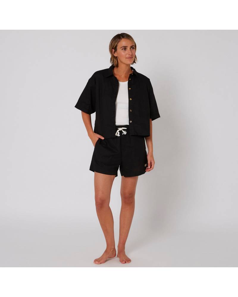 Model in full outfit with shorts